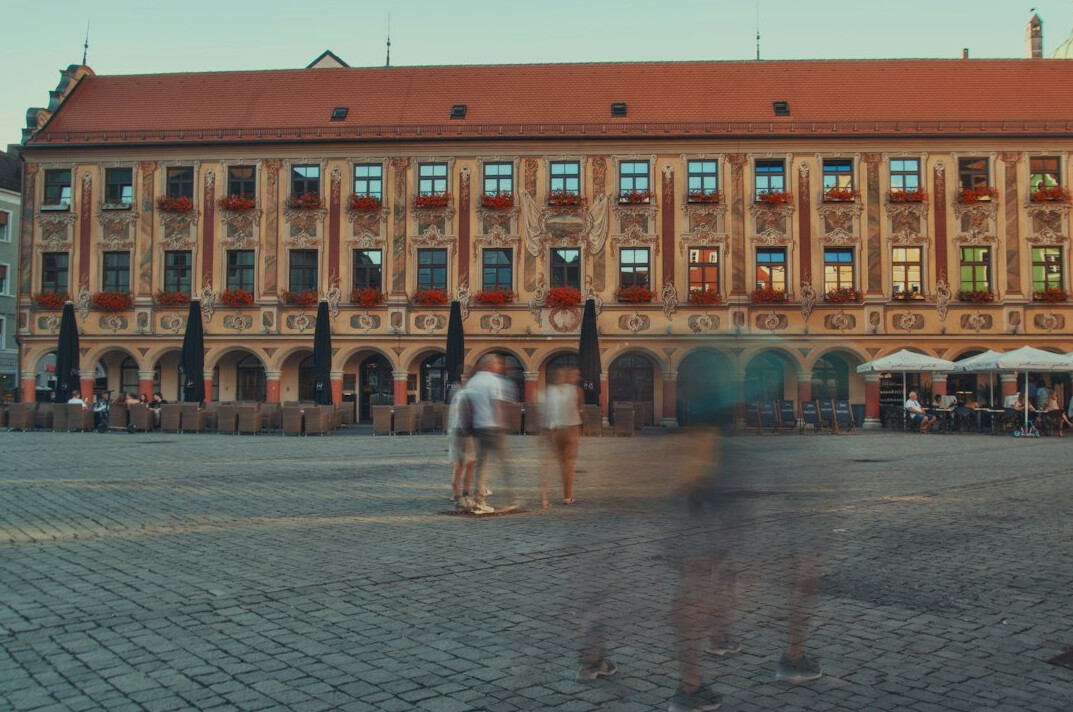 people chatting in city square