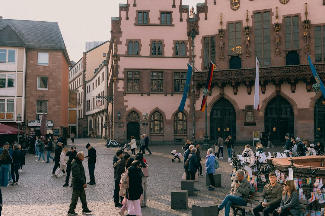 people gathering in city plaza