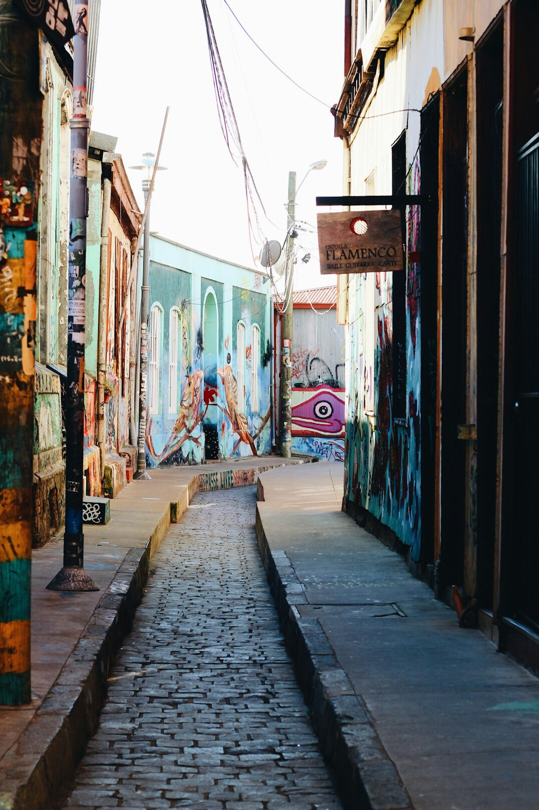 Colorful hillside houses and streets of Valparaiso Chile with pedestrians