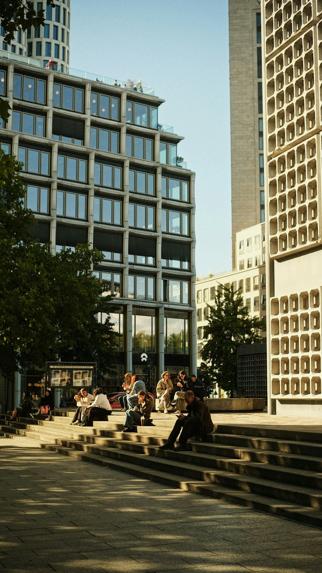 people chatting in public square