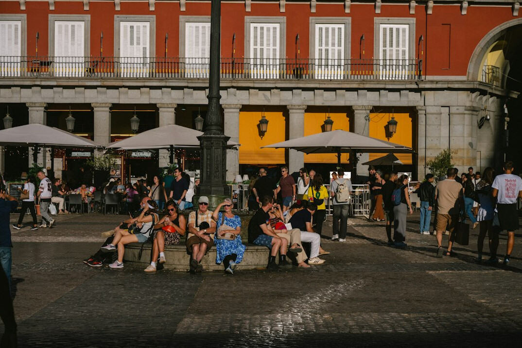 people chatting in public square